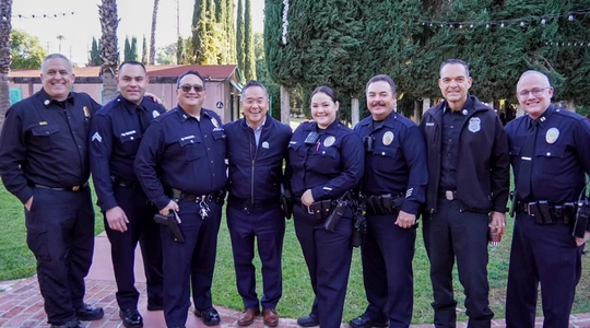 Councilmember Lee standing with LAPD Officers